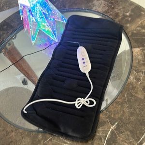 Vibrating massage heating pad by Conair